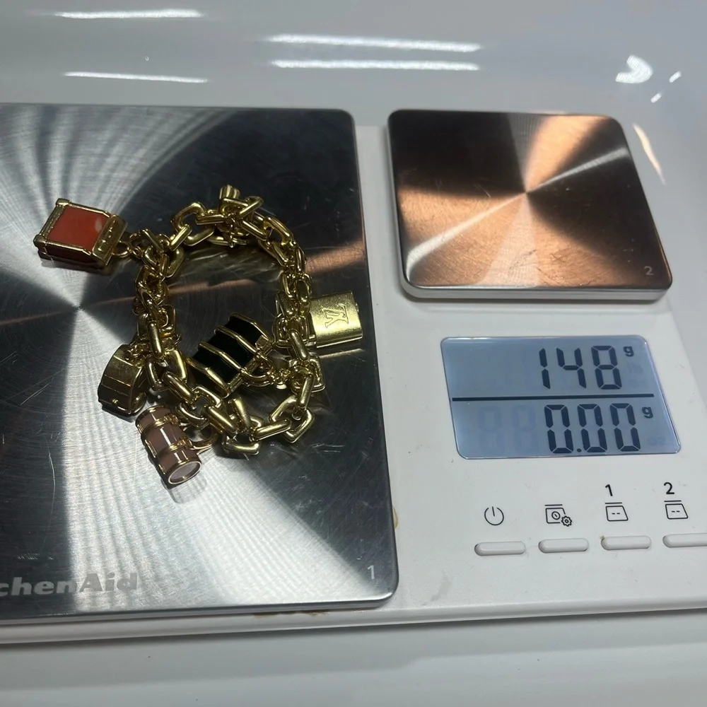 LOUIS VUITTON 2003 18KT GOLD CHARM BRACELET W/ 5 CHARMS - Picture 13 of 14